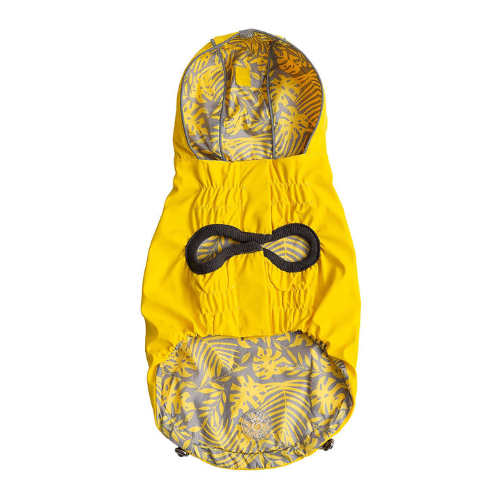 Yellow dog raincoat with jungle florals pattern on a white background