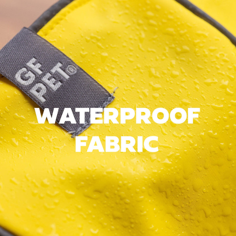 Yellow fabric with a GF PET label and 'Waterproof Fabric' text